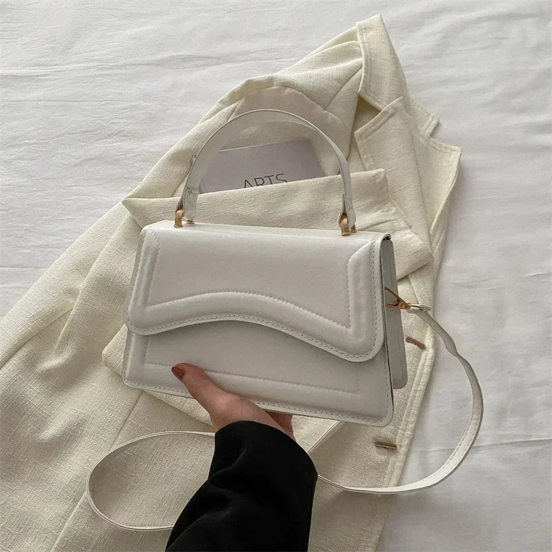 Bolso Aura de Lujo-Un bolso elegante y funcional que transmite exclusividad, confianza y buen gusto en cada detalle.