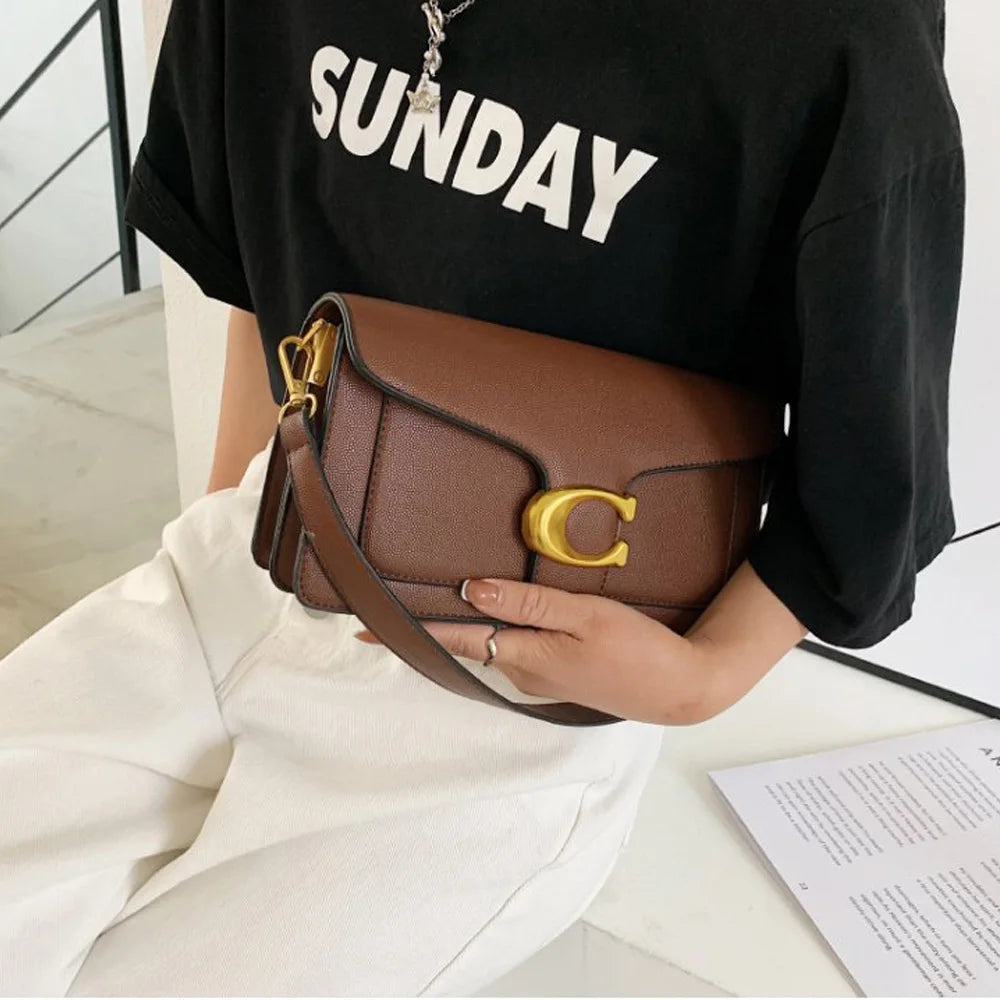 Bolso Doble Elegancia-Diseñado para mujeres que buscan estilo y comodidad. Sus dos correas ofrecen versatilidad para llevarlo al hombro o cruzado, adaptándose a cualquier ocasión.