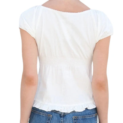 Rosélia Lace Bloom — Top corto elegante con acabado romántico, ideal para combinar con jeans, faldas o pantalones cargo
