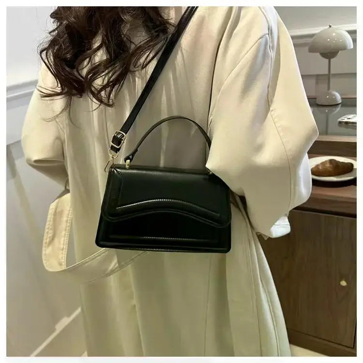 Bolso Aura de Lujo-Un bolso elegante y funcional que transmite exclusividad, confianza y buen gusto en cada detalle.