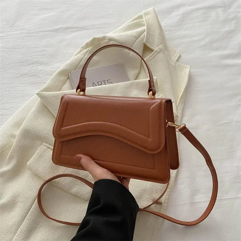 Bolso Aura de Lujo-Un bolso elegante y funcional que transmite exclusividad, confianza y buen gusto en cada detalle.