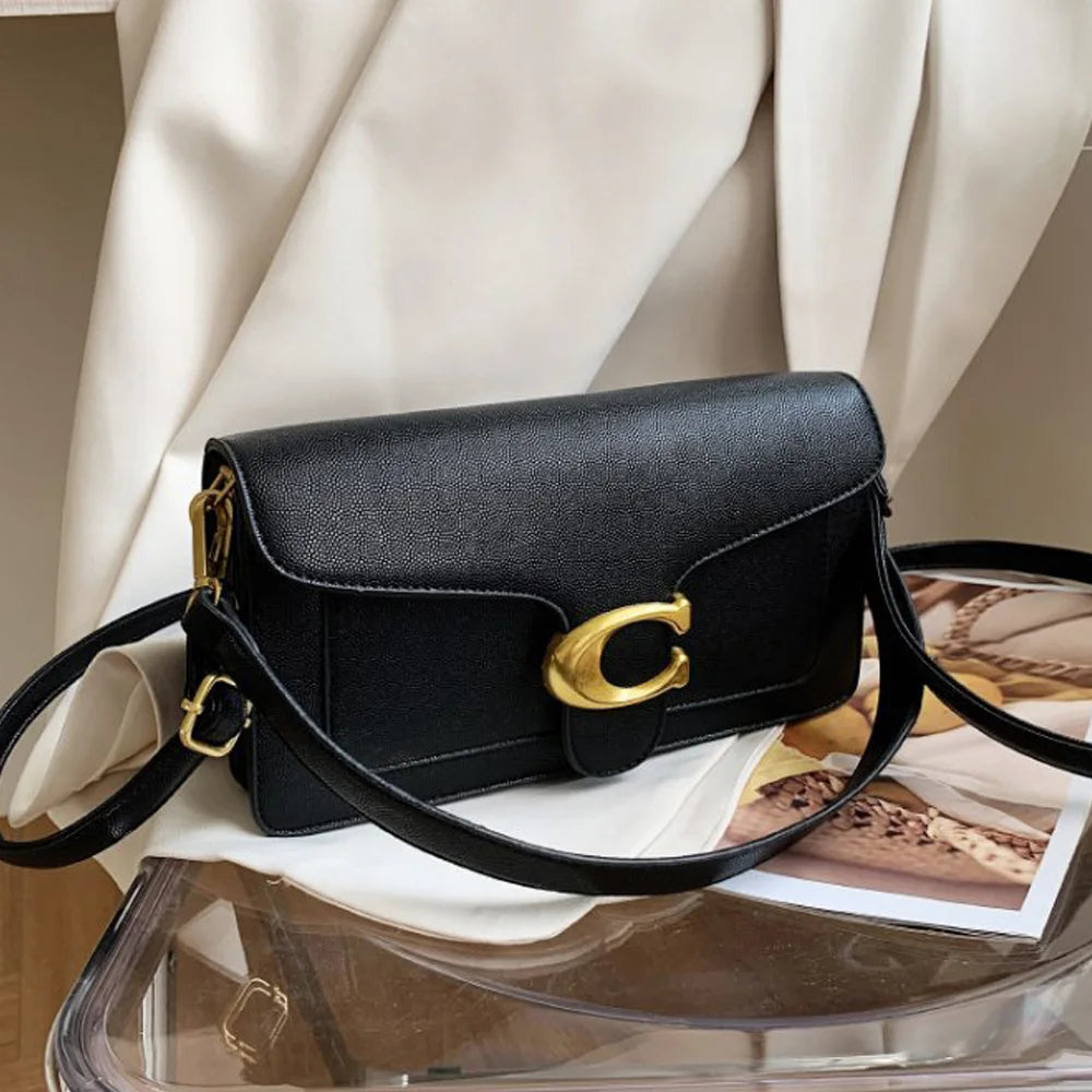 Bolso Doble Elegancia-Diseñado para mujeres que buscan estilo y comodidad. Sus dos correas ofrecen versatilidad para llevarlo al hombro o cruzado, adaptándose a cualquier ocasión.