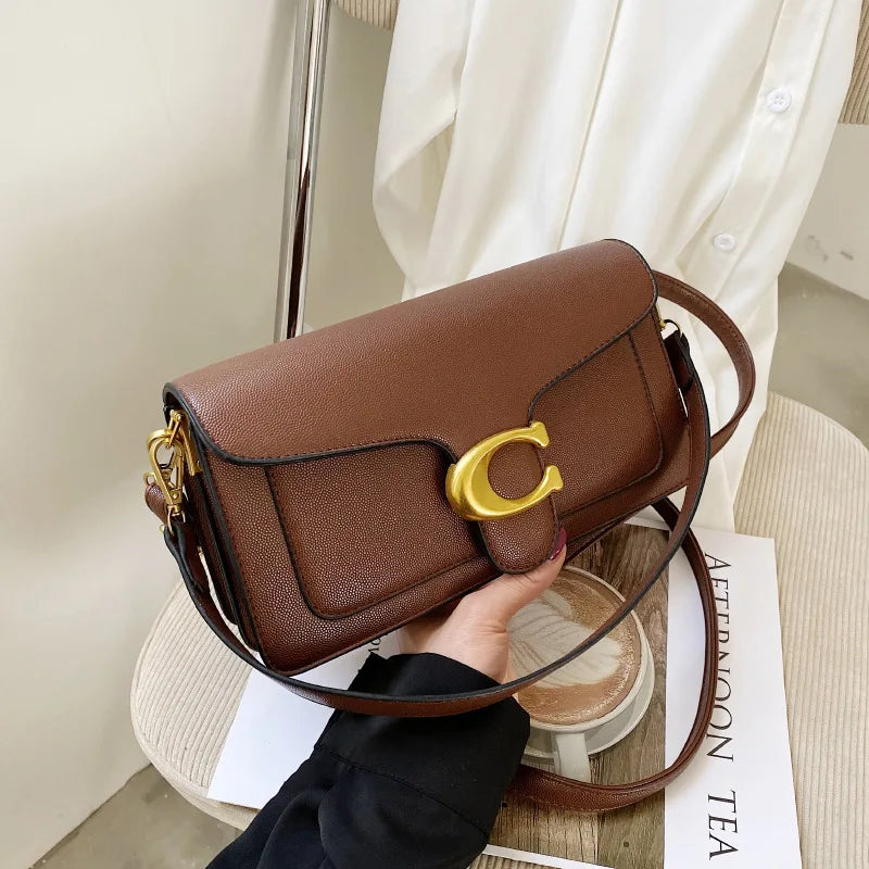 Bolso Doble Elegancia-Diseñado para mujeres que buscan estilo y comodidad. Sus dos correas ofrecen versatilidad para llevarlo al hombro o cruzado, adaptándose a cualquier ocasión.
