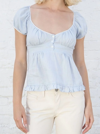 Rosélia Lace Bloom — Top corto elegante con acabado romántico, ideal para combinar con jeans, faldas o pantalones cargo