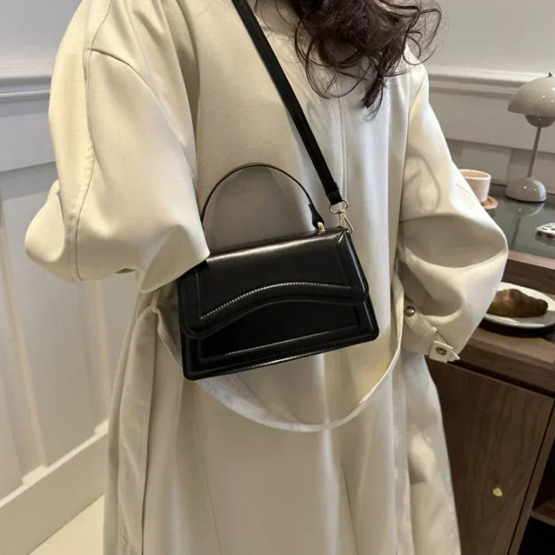 Bolso Aura de Lujo-Un bolso elegante y funcional que transmite exclusividad, confianza y buen gusto en cada detalle.