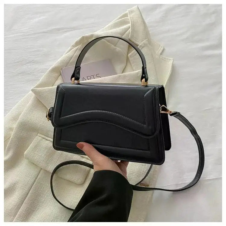 Bolso Aura de Lujo-Un bolso elegante y funcional que transmite exclusividad, confianza y buen gusto en cada detalle.