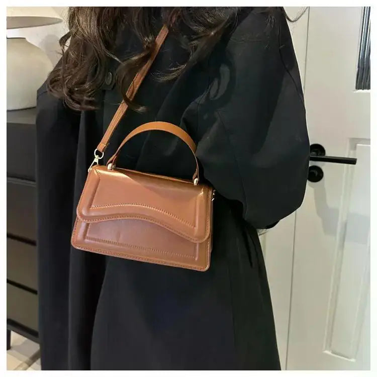 Bolso Aura de Lujo-Un bolso elegante y funcional que transmite exclusividad, confianza y buen gusto en cada detalle.