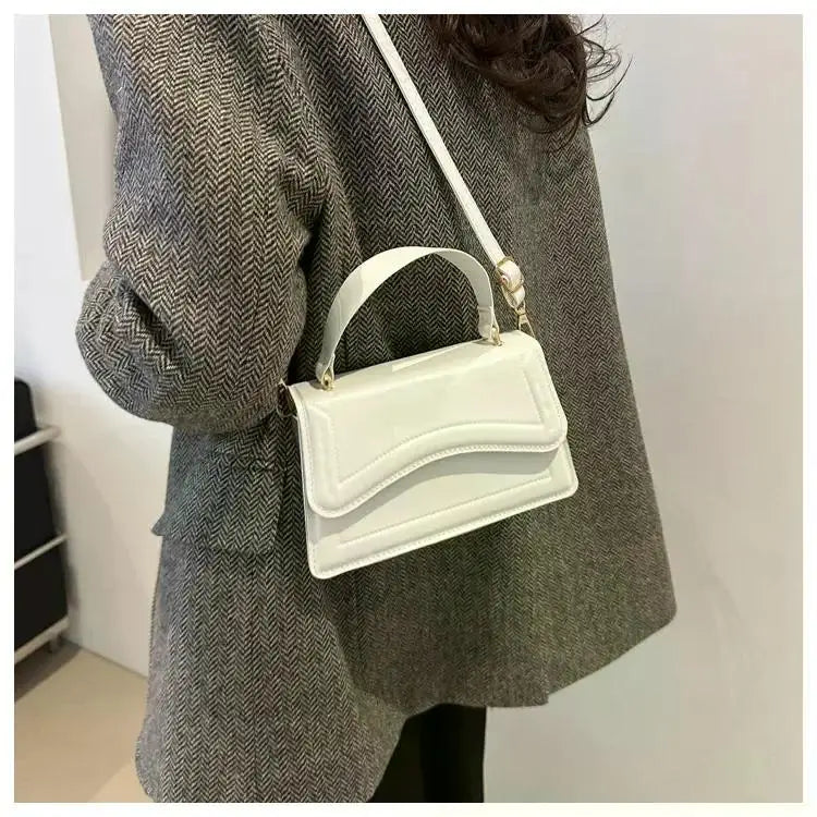 Bolso Aura de Lujo-Un bolso elegante y funcional que transmite exclusividad, confianza y buen gusto en cada detalle.