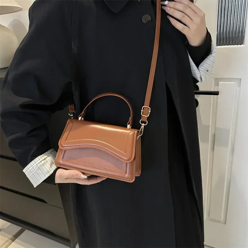Bolso Aura de Lujo-Un bolso elegante y funcional que transmite exclusividad, confianza y buen gusto en cada detalle.