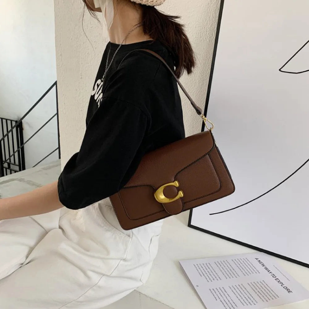 Bolso Doble Elegancia-Diseñado para mujeres que buscan estilo y comodidad. Sus dos correas ofrecen versatilidad para llevarlo al hombro o cruzado, adaptándose a cualquier ocasión.